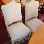 A set of six Louis XV style dining chairs, with cream upholstery, raised on cabriole legs