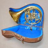 A Weltklang brass french horn, with travel case