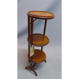 An early 20th century burr walnut three tier cake stand