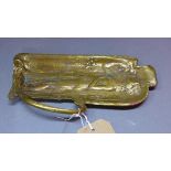 An Art Nouveau brass tray, decorated with a lady with flowing robes, W.25cm