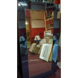 A wall mirror with blue outer, H.145 W.74cm (a/f)