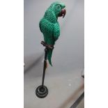 A fibreglass model of a parrot, raised on steel base, H.118cm