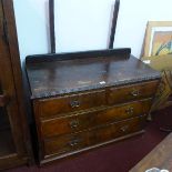 An Edwardian mahogany dressing chest, with mirror over two short and two long drawers, raised on