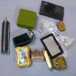 A miscellaneous collection of items to include lead soldiers, Van Cleef & Arpels mirror, dice box,