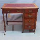 A Victorian mahogany knee hole desk, with five drawers, raised on turned legs and castors, H.75 W.92