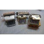 A vintage Remington Rand Noiseless typewriter, together with a vintage Olivetti typewriter, and a