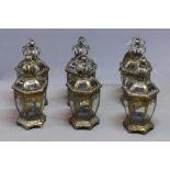 A set of six gilt metal hexagonal storm lanterns
