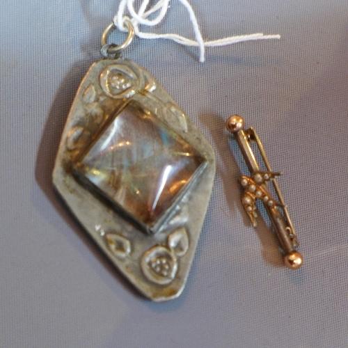 An Art Nouveau pewter butterfly wing brooch, together with a white metal bird brooch set with pearls