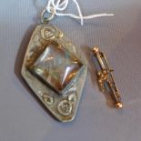 An Art Nouveau pewter butterfly wing brooch, together with a white metal bird brooch set with pearls