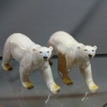 A pair of ceramic models of polar bears