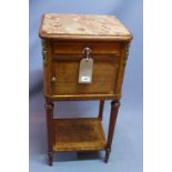 An early 20th century French walnut lamp table, with marble top over one drawer, one door, raised on