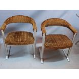 A pair of Race brush steel chairs, having velour upholstery, (2)