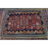 An extremely fine Southwest Persian Qashqai kilim with repeating stylised geometric motifs on a