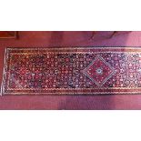 A fine Northwest Persian Malayer runner, with a central diamond medallion with repeating hepatic