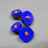 A pair of octagonal lapis lazuli cufflinks, inset to centre with rubies