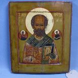 A Russian icon of St Nicholas of Myra, tempera on wood panel, parcel gilded, 32 x 26cm