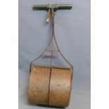 A vintage garden roller