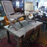 A weathered teak garden table, together with four weathered teak chairs, (5)