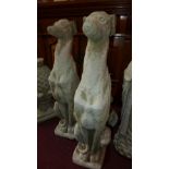 Two reconstituted stone greyhounds, seated on square bases, H.75cm