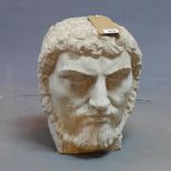 A carved stone bust of a Roman Emperor, H.38cm