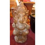 A carved stone figure of Ganesh, H.63cm