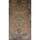 An extremely fine hand made pure silk oriental rug, embossed decorated with vase of flowers, signed,