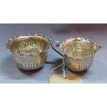 A Victorian silver bowl and matching milk jug, having gadrooned decoration and embossed with