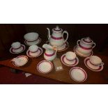 A Limoges porcelain tea set for four