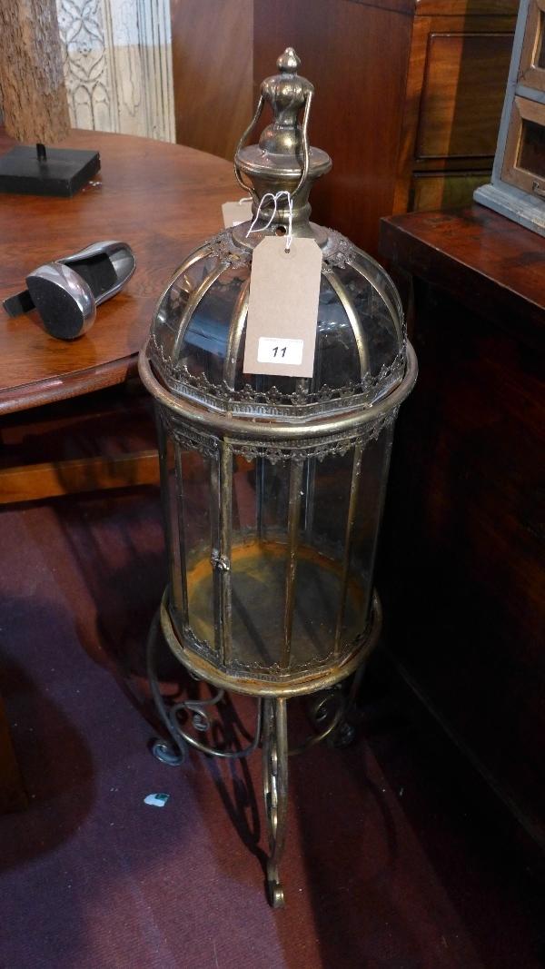 A gilt metal storm lantern, on stand, H.108cm