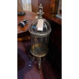 A gilt metal storm lantern, on stand, H.108cm