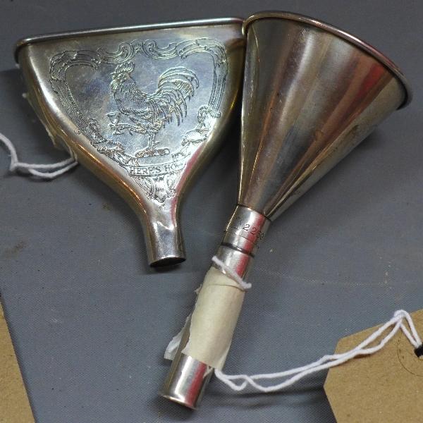 A silver perfume funnel, engraved with crest depicting a cockerel holding a goblet within a C-scroll