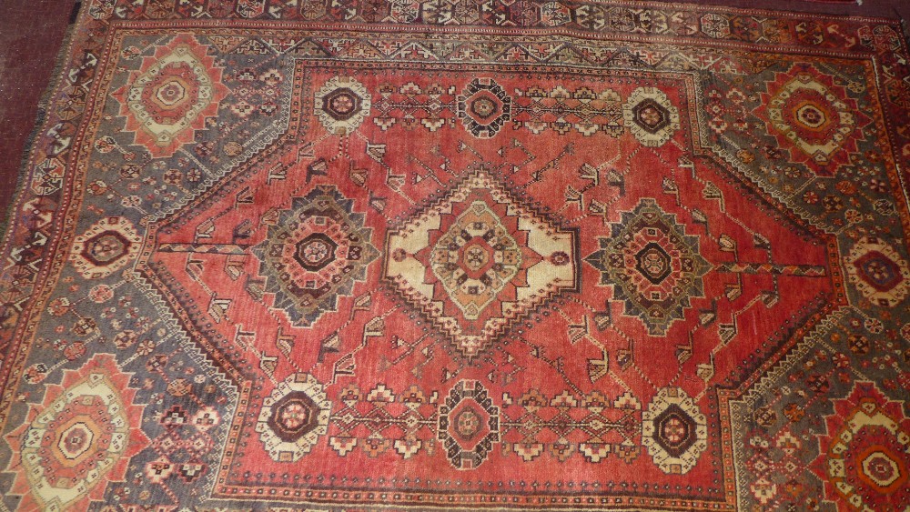 An extremely fine South West Persian Qashqai rug, 219cm x 150cm, central medallion on a terracotta