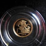 A quarter sovereign gold proof coin with box and papers