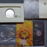 A 1oz Silver Britannia coin, Vivat Regina £5 coin and a silver 50p Kew Gardens commemorative coin