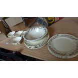 A Suzie Cooper dinner service, plates, tureen, cups and side plates etc