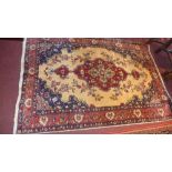 A fine North West Persian Sarouk rug, with triple pole medallion on an ivory field having blue