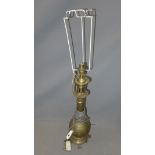 A brass table lamp of bulbous shape h52cm