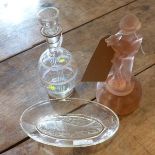 An Art Deco moulded pink glass figure of a young girl, a painted decanter and an oval glass bowl,