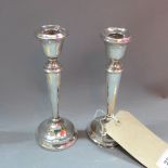 A set of 3 late 19th/early 20th century wine glasses and two small stoppered chemists jars.