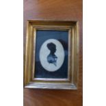 A small gilt framed silhouette of a lady, h18 w14cm