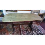 An Ercol elm topped refectory style table H.70 L.155 W.75cm