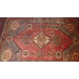 An extremely fine South West Persian Qashqai rug, central medallion on a terracotta field within