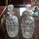 A pair of early 19th century cut glass decanters