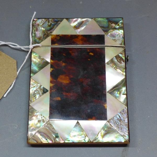 A 19th century mother of pearl and tortoiseshell inlaid card case, 11x8cm