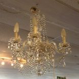 An 18th century style six branch crystal chandelier, complete