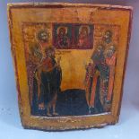 A Russian icon depicting The Mother of God appearing before saints, tempera on wood panel with