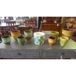 A collection of Poole Pottery vases, (9)