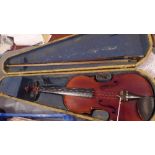 A violin with bow and case, bearing label reading 'Antonio Stradivarius Cremonsi, Faciebat no 1713'