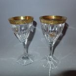 Two Persian early Pahlavi Mohmad Reza Shah crystal wine glasses, decorated with 22ct gold rim and