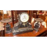 A late 19th century French black slate and variegated marble mantel clock and garniture, drum